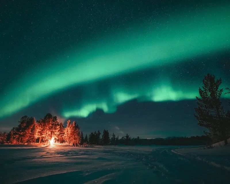 Aurora Boreal e fogueira na Lapônia